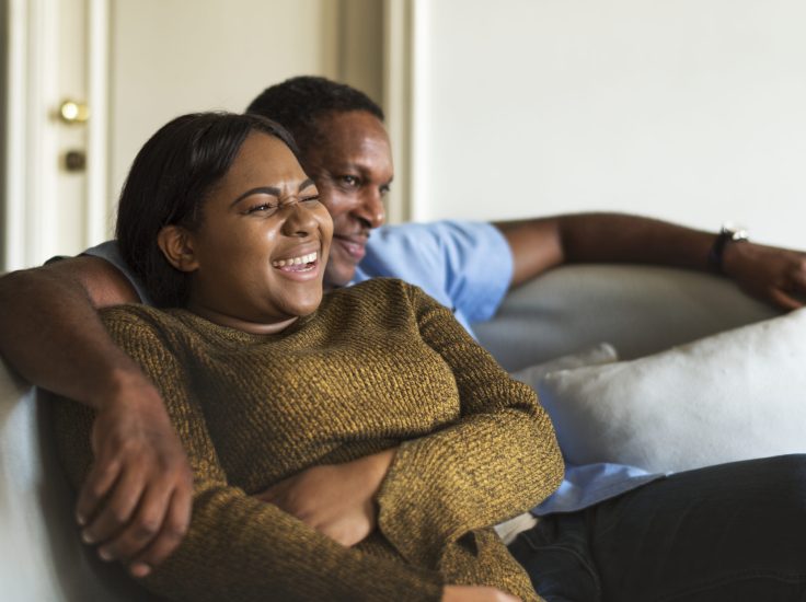 African couple having a great time together